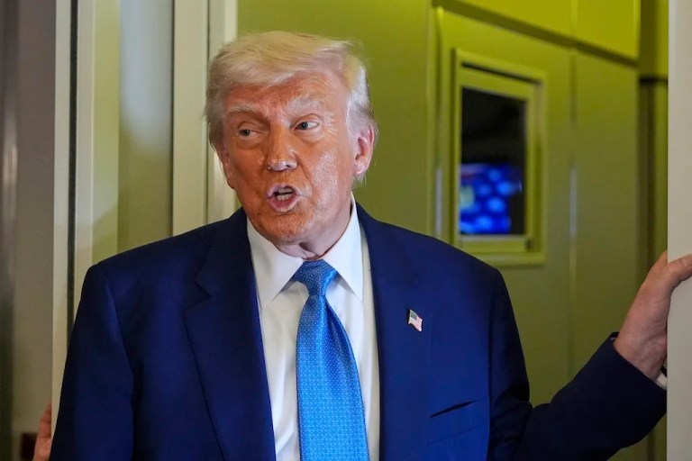 President Donald Trump speaks on Air Force One at Abu Dhabi International Airport before departing, Friday, May 16, 2025, in Abu Dhabi, United Arab Emirates. (AP Photo/Alex Brandon)