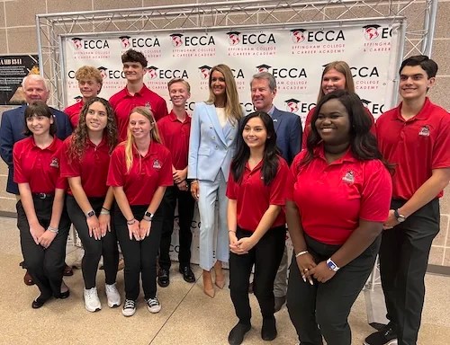 Small Business Administration Administrator Kelly Loeffler and Gov. Brian Kemp (R-GA) stand with students following a tour of the Effingham County College and Career Academy in Rincon, GA, on May 2, 2025. (Anna Giaritelli / Washington Examiner)