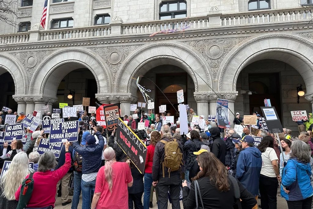 Supporters of Judge Hannah Dugan protest outside the United States Federal Building and Courthouse in Milwaukee, Wis. on Thursday, April 15, 2025 ahead of Dugan's arraignment on charges that she helped a man in the country illegally evade arrest by immigration authorities. (AP Photo/Todd Richmond)