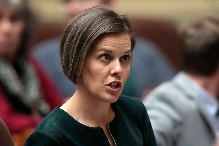FILE -State Rep. Laurel Libby, R-Auburn, speaks with a colleague, Feb. 14, 2023, at the State House in Augusta, Maine. (AP Photo/Robert F. Bukaty, File)