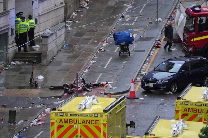 Man arrested after plowing car through crowd at Liverpool title parade, injuring dozens