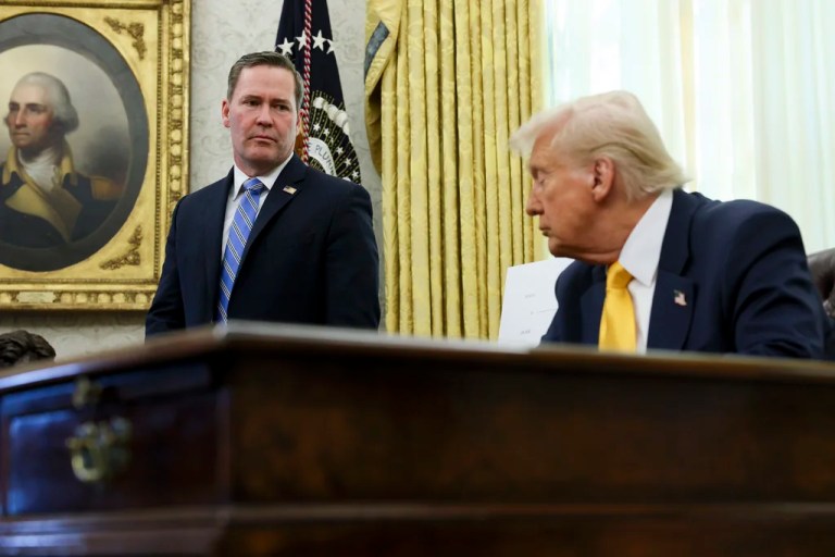 White House national security adviser Mike Waltz listens as President Donald Trump speaks in the Oval Office of the White House in Washington, Friday, March 7, 2025.
