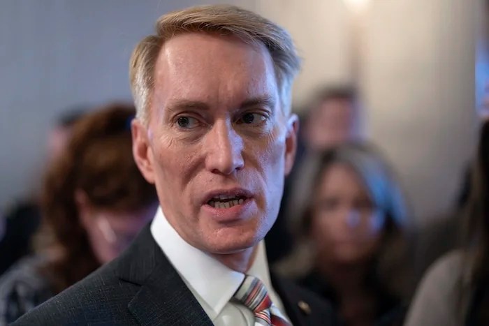 Sen. James Lankford, R-Okla., the lead GOP negotiator on a border-foreign aid package, speaks with reporters outside the chamber at the Capitol in Washington, Thursday, Jan. 25, 2024. Any bipartisan border deal could be doomed because of resistance from former President Donald Trump. (AP Photo/J. Scott Applewhite)