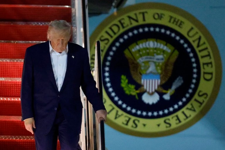 President Donald Trump walks down the stairs of Air Force One upon his arrival at Joint Base Andrews, Md., Friday, May 16, 2025. (AP Photo/Luis M. Alvarez)