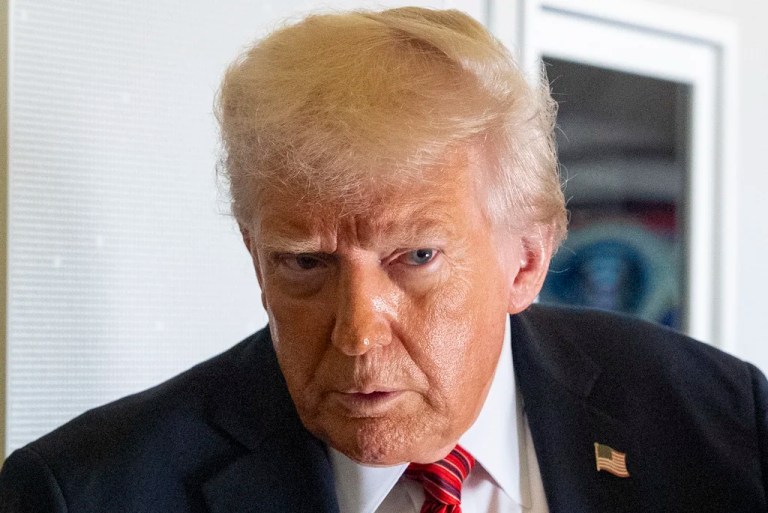 President Donald Trump speaks to reporters aboard Air Force One en route from Riyadh, Saudi Arabia to Doha, Qatar, Wednesday, May 14, 2025.