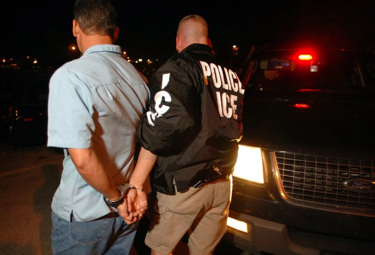 An agent of the Immigration and Customs Enforcement agency arrests a man picked up in Brockton, Massachusetts. Monday, June 13, 2005 during an effort to arrest illegal immigrants who have been charged with crimes during their time in the United States. Homeland Security officials had a list of 170 individuals targeted for arrest on federal charges.