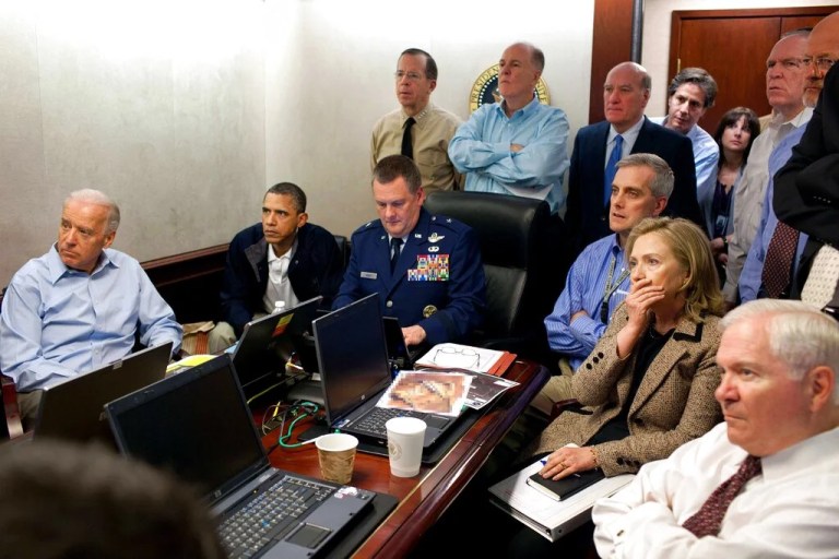 FILE - In this May 1, 2011 image released by the White House and digitally altered by the source to diffuse the paper in front of Secretary of State Hillary Rodham Clinton, President Barack Obama and Vice President Joe Biden, along with with members of the national security team, receive an update on the mission against Osama bin Laden in the Situation Room of the White House in Washington