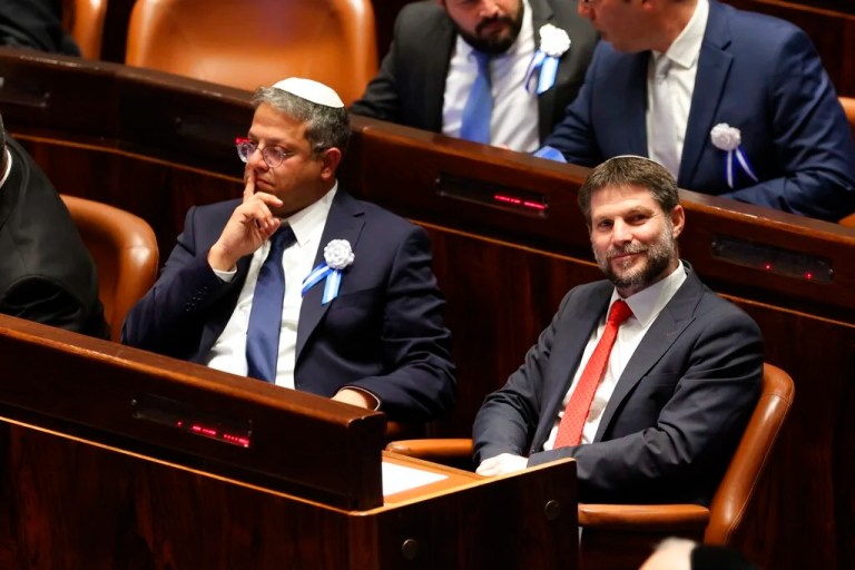 Israeli right-wing Knesset member Itamar Ben-Gvir, left, and Bezalel Smotrich look on during the swearing-in ceremony for Israeli lawmakers at Israel's parliament in Jerusalem, Tuesday, Nov. 15, 2022. Israeli lawmakers were sworn in at the Knesset, on Tuesday, following national elections earlier this month.