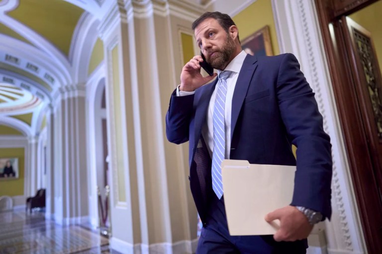 Sen. Markwayne Mullin, R-Okla., leaves the chamber as Senate Republicans meet for discussions on advancing President Donald Trump's bill of tax breaks and spending cuts.