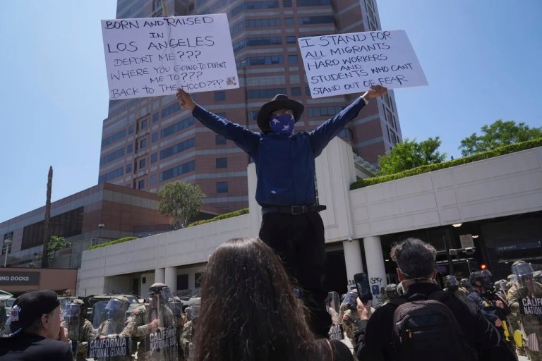 Protesters gather outside the metropolitan detention center in downtown Los Angeles,