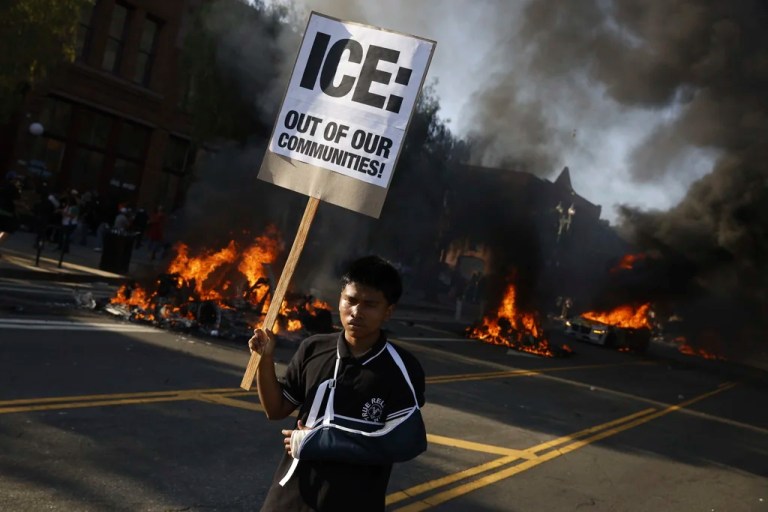 Protesters in downtown Los Angeles voice their outrage against ICE raids that occurred over the weekend, in Los Angeles, on Sunday, June 8, 2025.