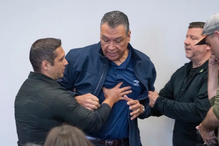 Sen. Alex Padilla (D-CA) is pushed out of the room as Homeland Security Secretary Kristi Noem holds a news conference regarding the recent protests in Los Angeles, Thursday, June 12, 2025.