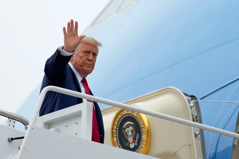 President Donald Trump waves as he boards Air Force One, Sunday, June 15, 2025