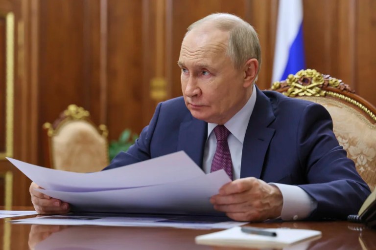 Russian President Vladimir Putin listens to Sevastopol Gov. Mikhail Razvozhayev during their meeting at the Kremlin in Moscow, Russia, Monday, June 16, 2025.