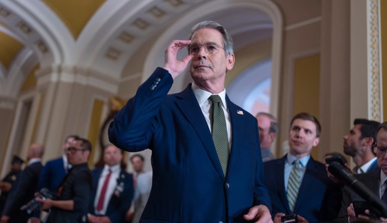 Treasury Secretary Scott Bessent talks to reporters about his lunch meeting with Republican senators and the schedule for getting the Republican megabill to President Donald Trump's desk by July 4, at the Capitol in Washington, Tuesday, June 24, 2025.