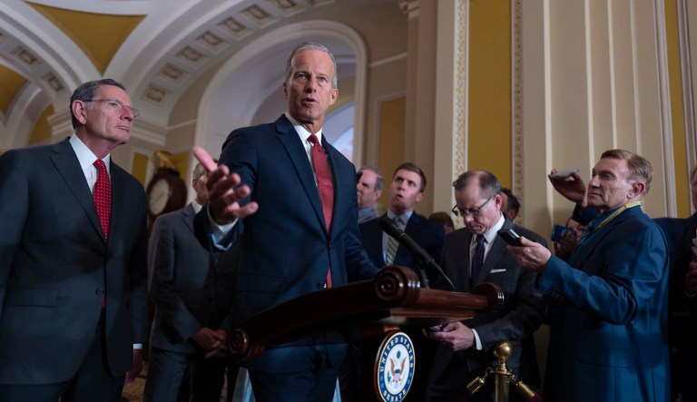 Senate Majority Leader John Thune, R-S.D., center, joined at left by Sen. John Barrasso, R-Wyo., the GOP whip, speaks to reporters after Republican senators met with Treasury Secretary Scott Bessent and worked on President Donald Trump's tax and immigration megabill so they can have on his desk by July 4, at the Capitol in Washington, Tuesday, June 24, 2025.