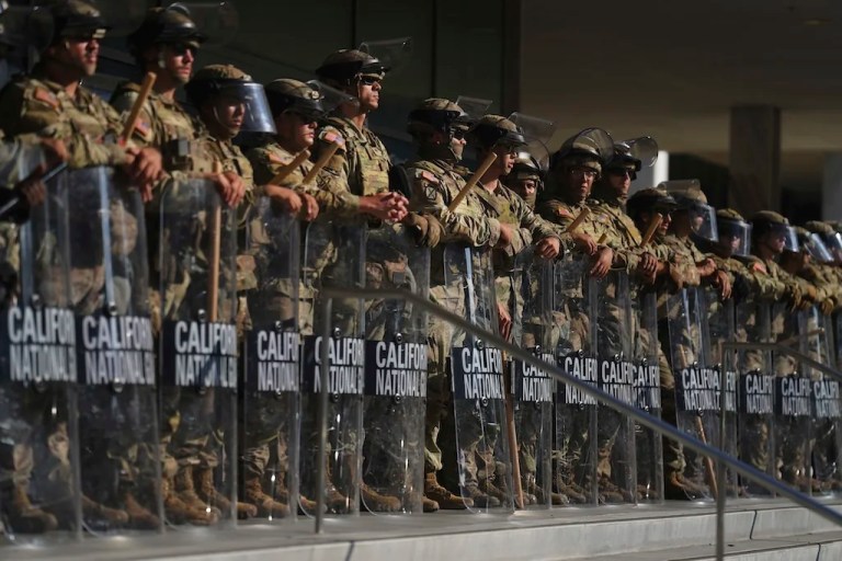 California National Guard members are positioned at the Federal Building on Tuesday, June 10, 2025, in downtown Los Angeles.