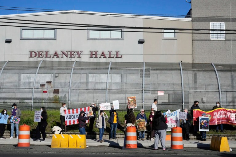 Protesters gather in front of Delaney Hall, a recently re-opened immigration detention center, in Newark, N.J., Wednesday, May 7, 2025.