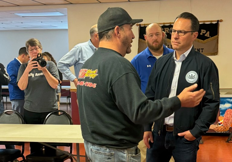 Gov. Josh Shapiro (D-PA) meets with small business owners at the Meyersdale Volunteer Fire Company on Main Street after a flash flood caused severe damage to the area.
