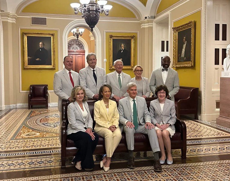 Senators pose on Seersucker Day in the Senate. (Lauren Green/ Washington Examiner)