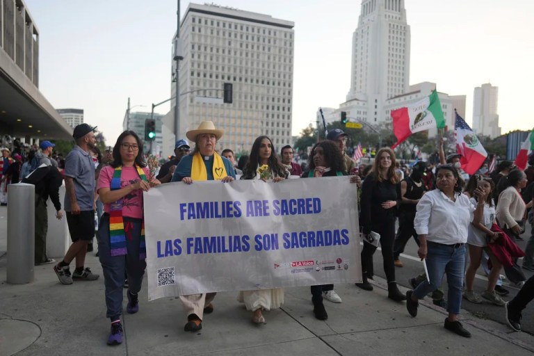 Demonstrators march during a protest Tuesday, June 10, 2025, in Los Angeles.