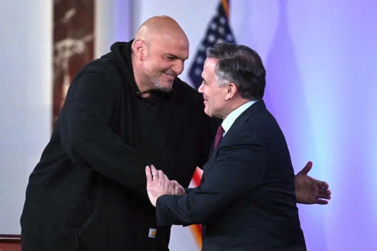 Pennsylvania Sens. John Fetterman (D), left, and Dave McCormick (R), right, greet before participating in a debate moderated by Fox News anchor Shannon Bream, not shown, Monday, June 2, 2025, at the Edward M. Kennedy Institute for the United States Senate, Monday, June 2, 2025, in Boston, as livestreamed on Fox Nation.