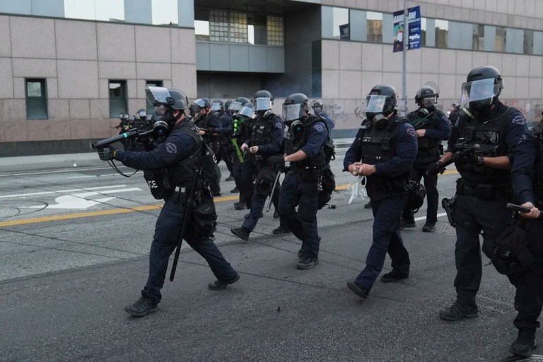 Anti-ICE protesters clash with police in Los Angeles after wave of raids