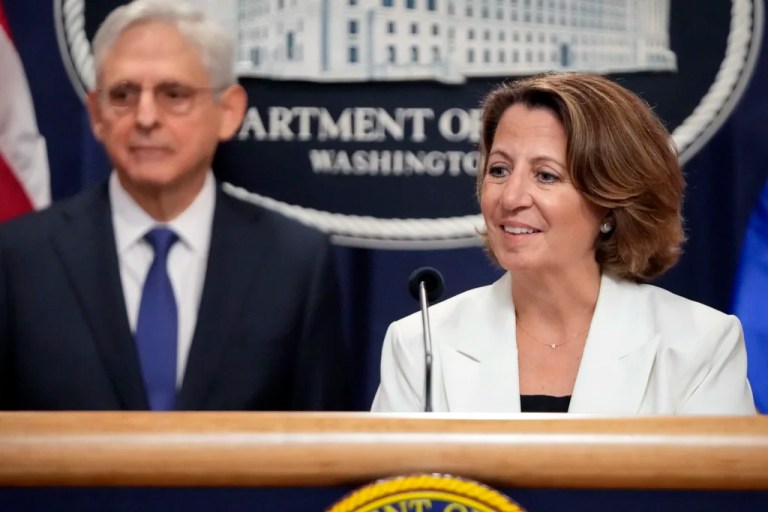 Deputy Attorney General Lisa Monaco speaks with reporters about an antitrust lawsuit against real estate software company RealPage during a news conference at the Department of Justice, Friday, Aug. 23, 2024, in Washington. At left is Attorney General Merrick Garland. (AP Photo/Mark Schiefelbein)