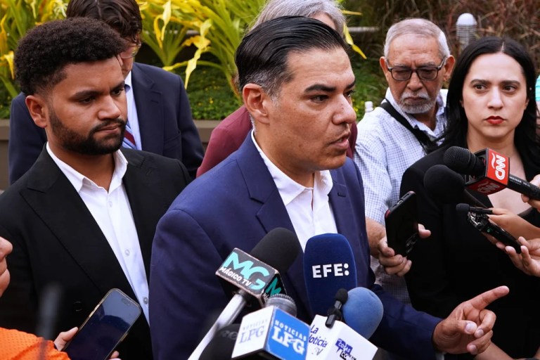 Rep. Robert Garcia, D-Calif., speaks to the media about Kilmar Abrego Garcia, a Salvadoran citizen who was living in Maryland and deported to El Salvador by the Trump administration, accompanied by Rep. Maxwell Frost, D-Fla., left, at a hotel in San Salvador, El Salvador, Monday, April 21, 2025. (AP Photo/Salvador Melendez)