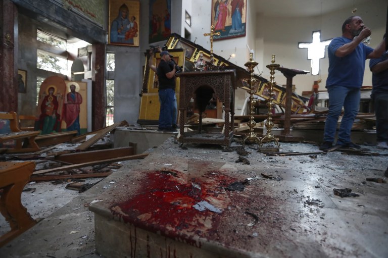 Christians killed in suspected Islamic state suicide bombing at church in Syria