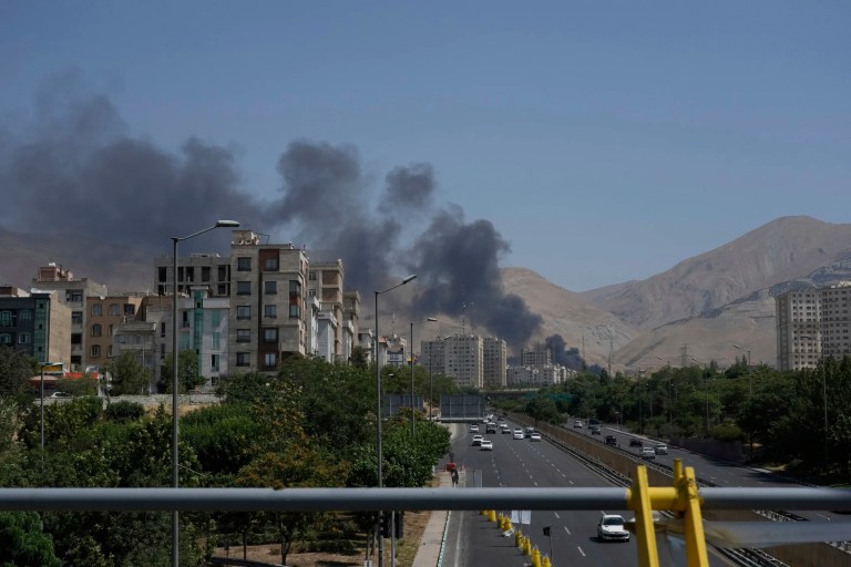 Smoke rises from an oil storage facility after reportedly being targeted by an Israeli strike on Saturday, in Tehran, Iran, Monday, June 16, 2025.