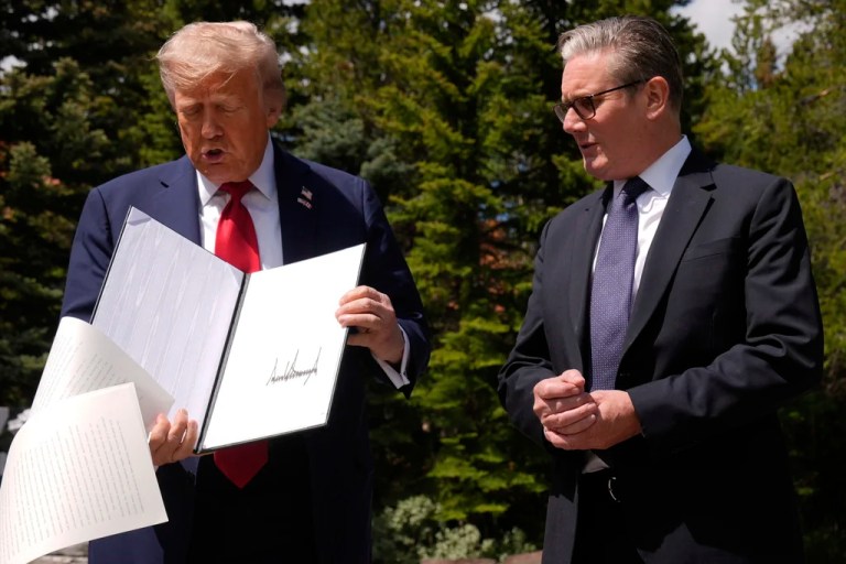 US and UK announce trade deal as Trump spills documents on the ground