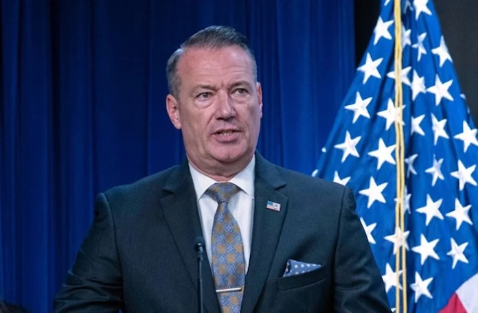Acting director of U.S. Immigration and Customs Enforcement (ICE) Todd Lyons flanked by Deputy director of U.S. Immigration and Customs Enforcement Madison Sheahan, speaks during a news conference at ICE Headquarters, in Washington, Wednesday, May 21, 2025. (AP Photo/Jose Luis Magana)