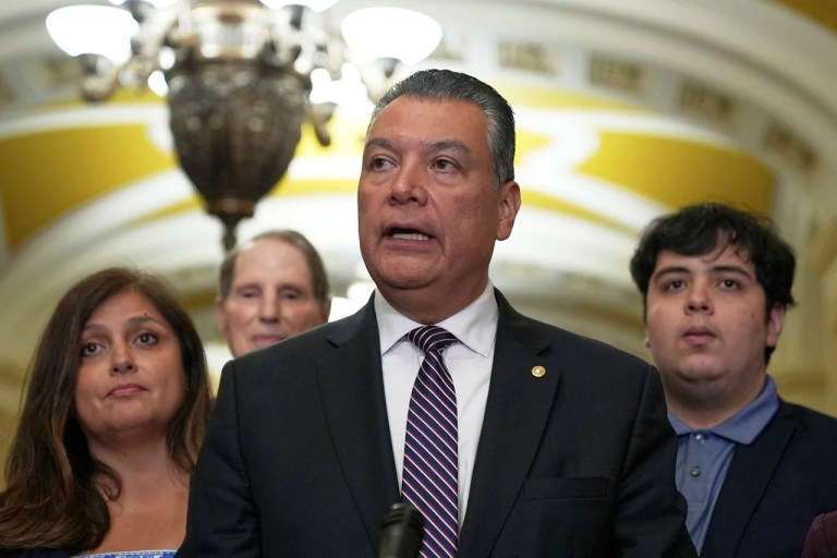 Sen. Alex Padilla, D-Calif., center, talks at the news conference after a policy luncheon on Capitol Hill, Tuesday, June. 17, 2025, in Washington.