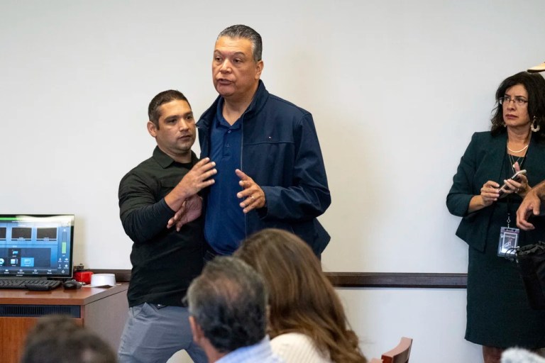 U.S. Sen. Alex Padilla, D-Calif., is pushed out of the room as Homeland Security Secretary Kristi Noem holds a news conference regarding the recent protests in Los Angeles, Thursday, June 12, 2025.