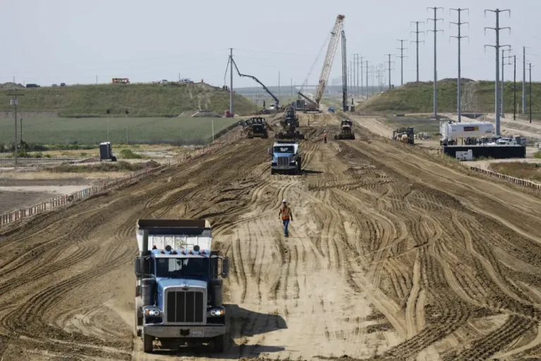 California High-Speed Rail Authority crews work at the Hanford Viaduct construction site.