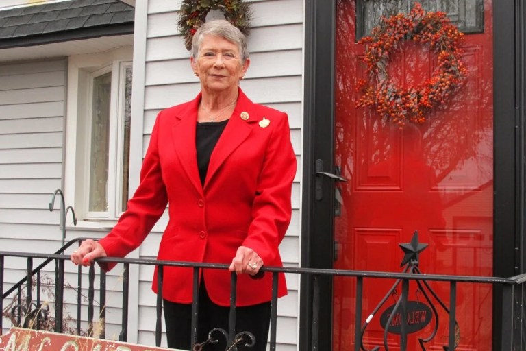 In this Dec. 2, 2014 photo, late Rep. Carolyn McCarthy (D-NY) poses for a photo outside her home in Mineola, New York. The nurse and housewife who went to Washington after her husband was killed and her son wounded in a notorious mass shooting says she is pleased with her legacy as a nine-term New York congresswoman.