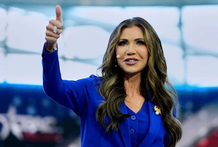 Homeland Security Secretary Kristi Noem arrives on stage to deliver a speech at the Conservative Political Action Conference, CPAC, Tuesday, May 27, 2025, in Jasionka, Poland. (AP Photo/Alex Brandon, Pool)