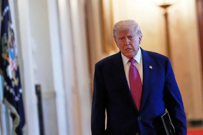 President Donald Trump walks to speak at an event to sign a bill blocking California's rule banning the sale of new gas-powered cars by 2035, in the East Room of the White House, Thursday, June 12, 2025, in Washington. (AP Photo/Alex Brandon)