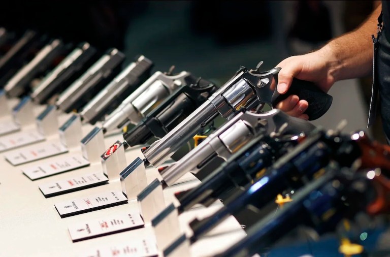 FILE - In this Jan. 19, 2016 file photo, handguns are displayed at the Shooting, Hunting and Outdoor Trade Show in Las Vegas. (AP Photo/John Locher, File)