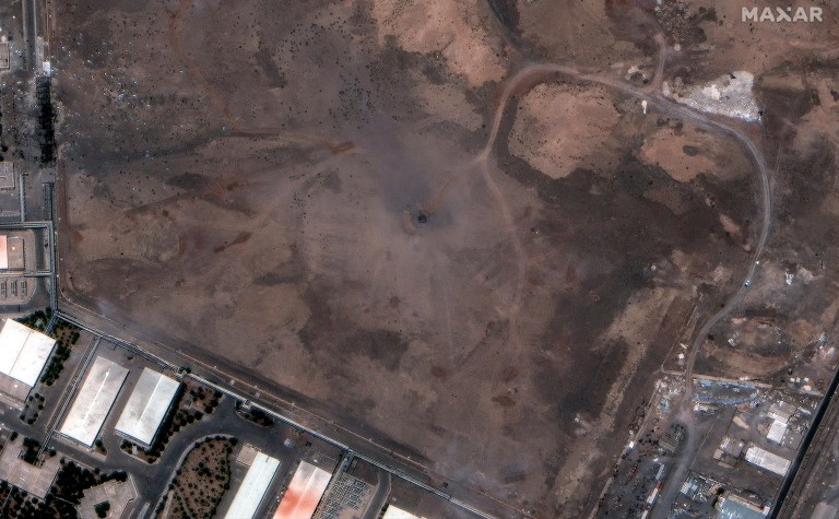 This satellite image provided by Maxar Technologies shows a crater over the underground Natanz enrichment facility in Iran after U.S. strikes, Sunday, June 22, 2025. (Maxar Technologies via AP)