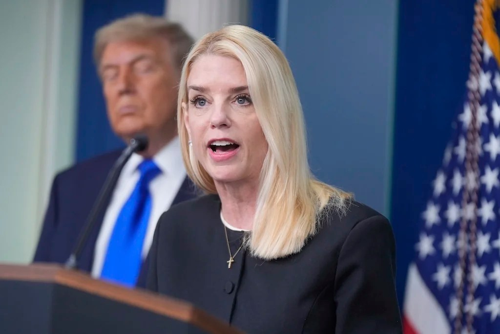 Attorney General Pam Bondi speaks to the media, Friday, June 27, 2025, in the briefing room of the White House in Washington, as President Trump looks on. (AP Photo/Manuel Ceneta)