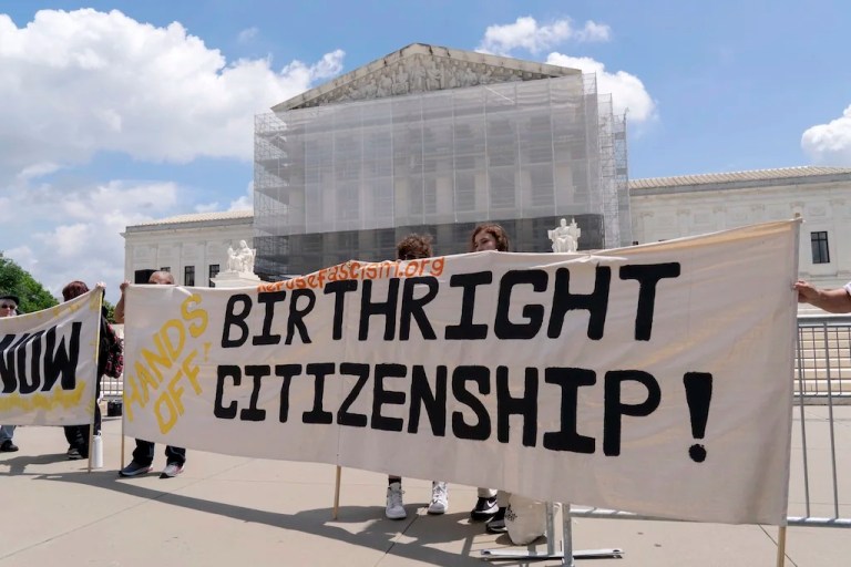 Demonstrators holds a banner during a citizenship rally outside of the Supreme Court in Washington, Thursday, May 15, 2025. (AP Photo/Jose Luis Magana)