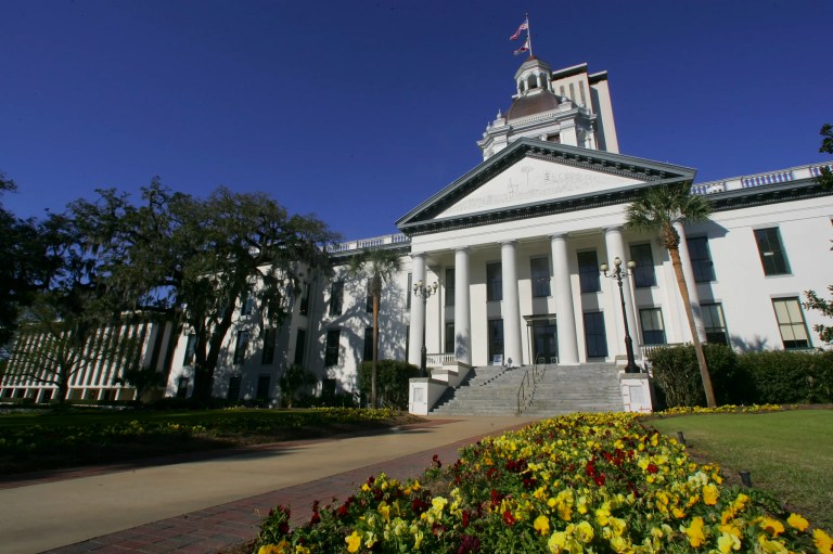 Flowers bloom near the Florida Capitol buildings Monday, March 4, 2013, in Tallahassee, Florida. The Florida Legislature convenes its 60-day session Tuesday.