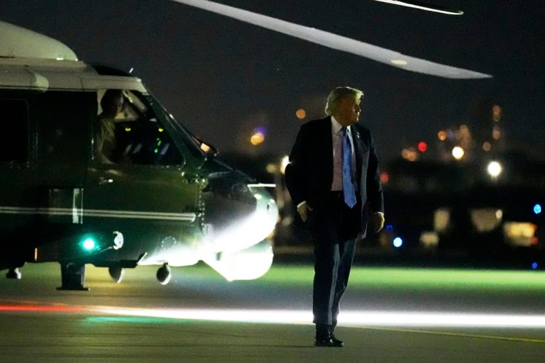 President Donald Trump walks from Marine One to board Air Force One at Calgary International Airport, Monday, June 16, 2025, in Calgary, Canada, on his way back to Washington.