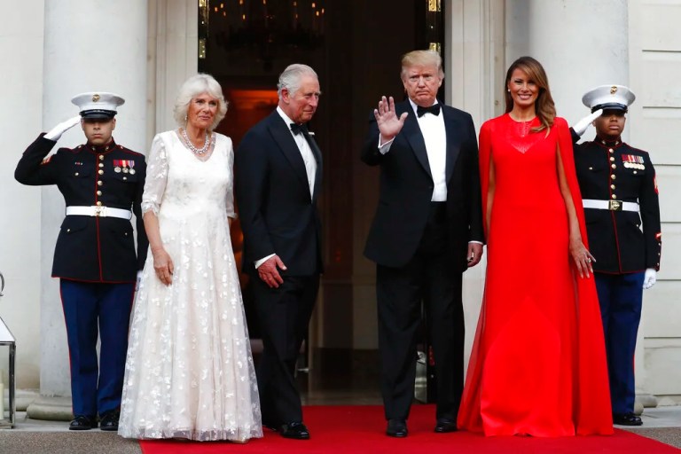 Britain's Prince Charles, centre left and Camilla, the Duchess of Cornwall, second left are greeted by US President Donald Trump and first lady Melania Trump, outside Winfield House, the residence of the Ambassador of the United States of America to the UK, in Regent's Park, for the Return Dinner as part of his state visit to the UK, in London, Tuesday June 4, 2019. (AP Photo/Alastair Grant)