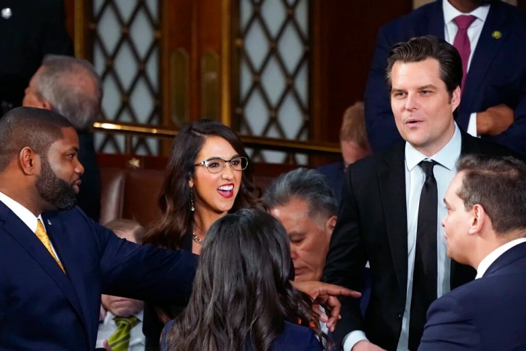 Reps. Lauren Boebert (R-CO), center, and Matt Gaetz (R-FL), right, talk to other members on the House floor before President Joe Biden arrives to deliver his State of the Union speech to a joint session of Congress, at the Capitol in Washington, Tuesday, Feb. 7, 2023.