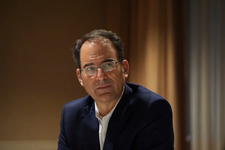 Colorado Attorney General Phil Weiser pauses during an interview with the 