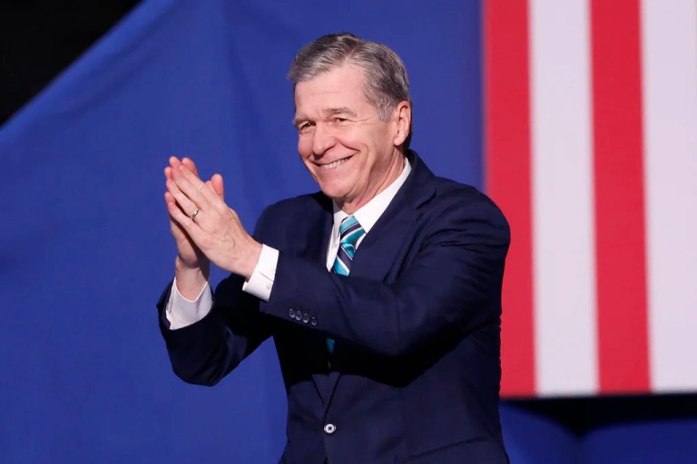 FILE - North Carolina Gov. Roy Cooper arrives to speak at a campaign event in Charlotte, N.C., Sept. 12, 2024. (AP Photo/Nell Redmond, File)