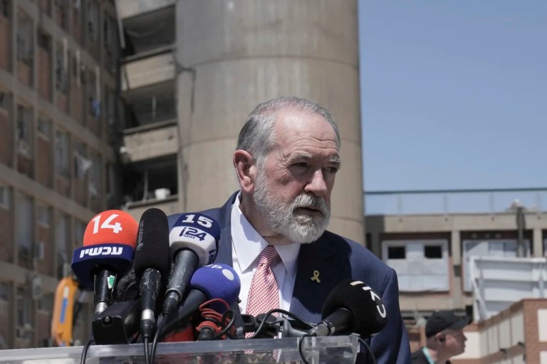 U.S. Ambassador to Israel Mike Huckabee speaks to journalists at Soroka Medical Center outside of a hospital building that was struck by an Iranian missile, Thursday, June 26, 2025 in Beersheba, Israel.